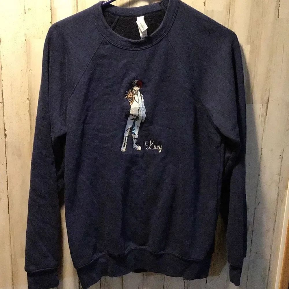 Sweatshirt emblazoned with todo Roku in hero suit size medium